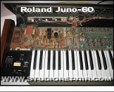 Roland Juno-60 - Opened * Opened case - left side view