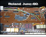 Roland Juno-60 - Picture * The right hand panel PCB contains the masked-programmed 80C49 panel controller. It scans all pots, sliders, buttons and stores the patches into memory and handles the cassette tape writing and reading.